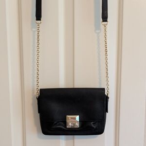 Elegant Black Crossbody Bag with Gold Accents